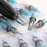 Stigma Aquamarine Knight Bugpin Mixed Cartridges. Close-up of aquamarine-tipped cartridges, some in blister packs, one in a tattoo pen